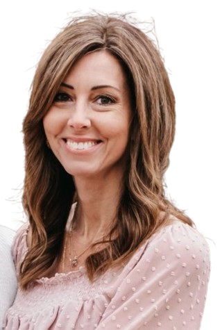 A woman with long hair smiles for the camera.